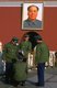 China: Military visitors in front of Chairman Mao's portrait at the Gate of Heavenly Peace (Tiananmen), Beijing